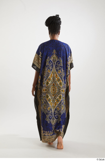 Dina Moses  1 back view dressed traditional decora long…